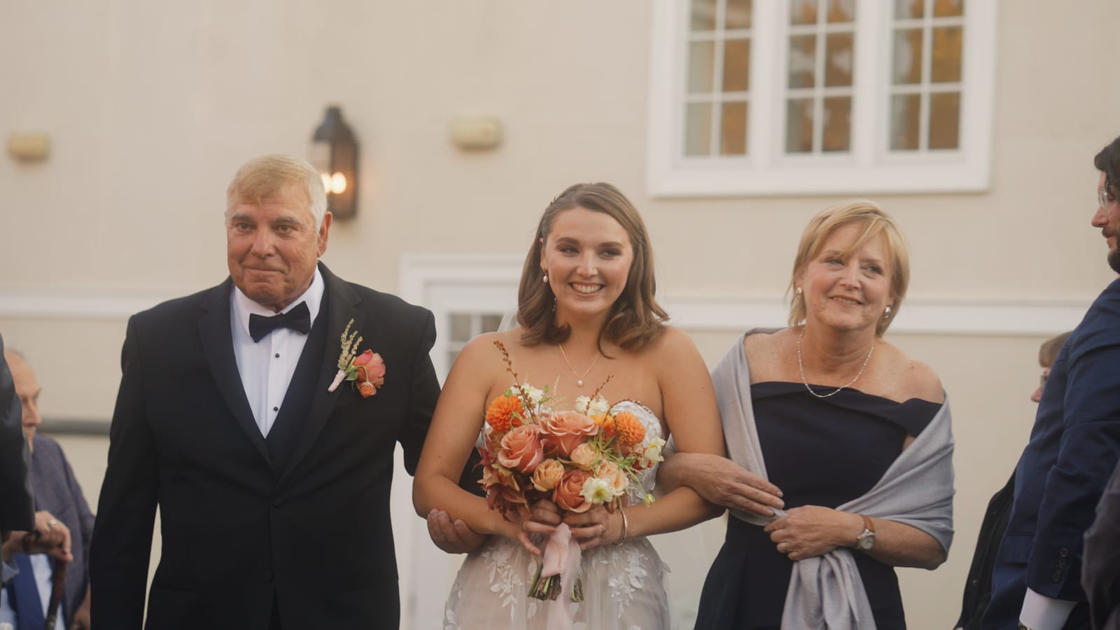Carly's bridal procession at her Ryland Inn wedding